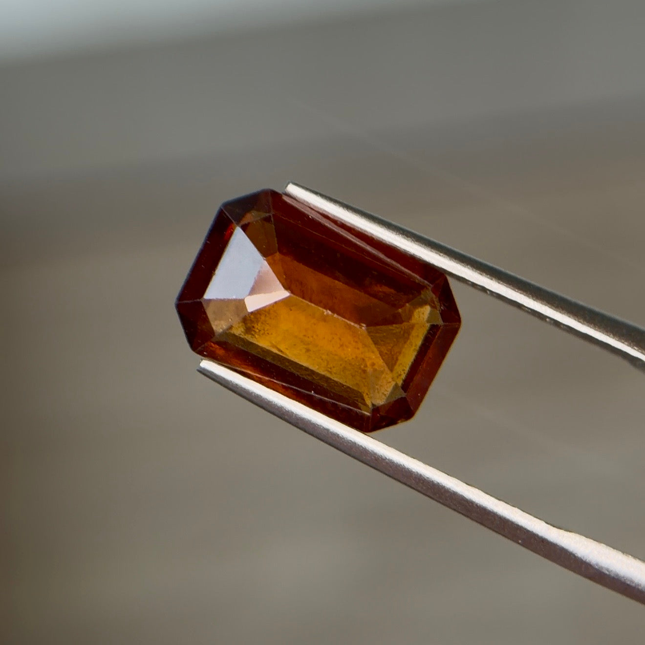 4.12 ct Natural Hessonite Garnet Honey Yellow – Emerald Cut – AIG Certified