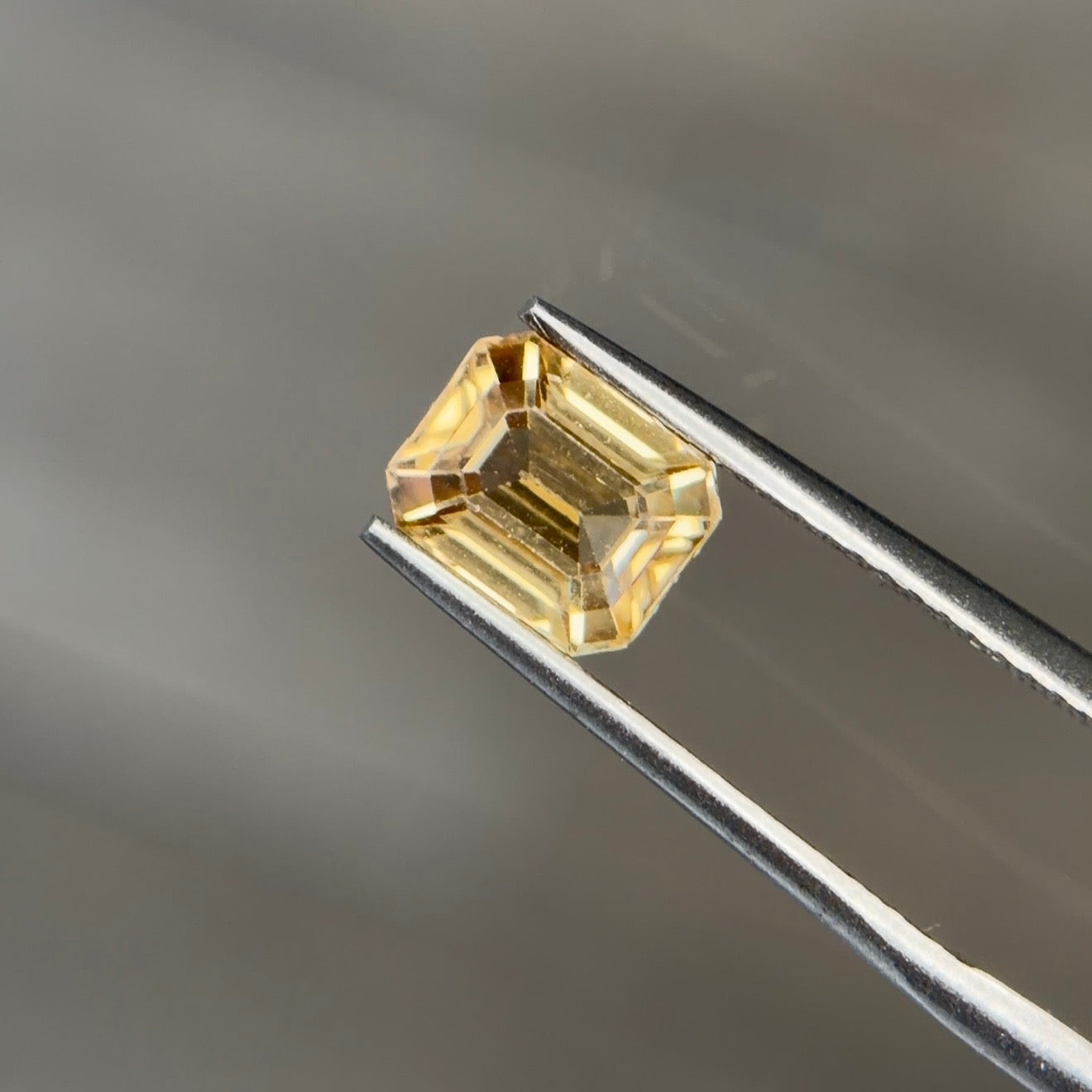 1.97 ct Natural Zircon Yellow – Emerald Cut – AIG Certified
