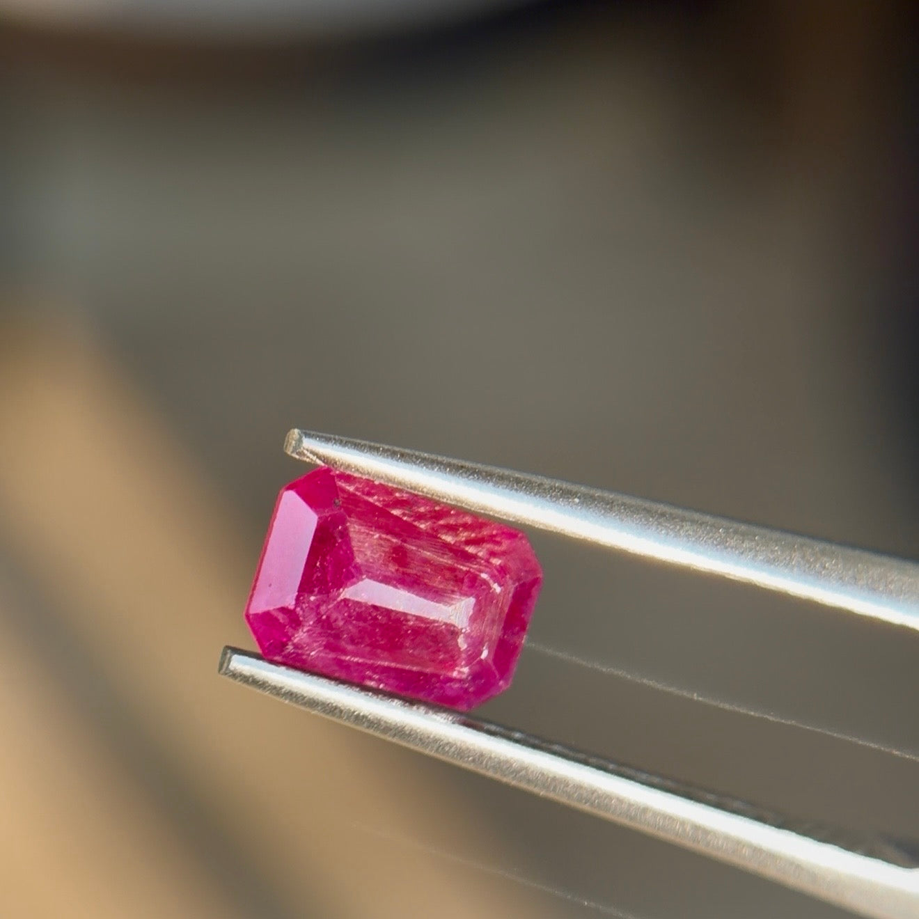 0.61 ct Natural Ruby Red Heated – Emerald Cut – Mozambique – AIG Certified