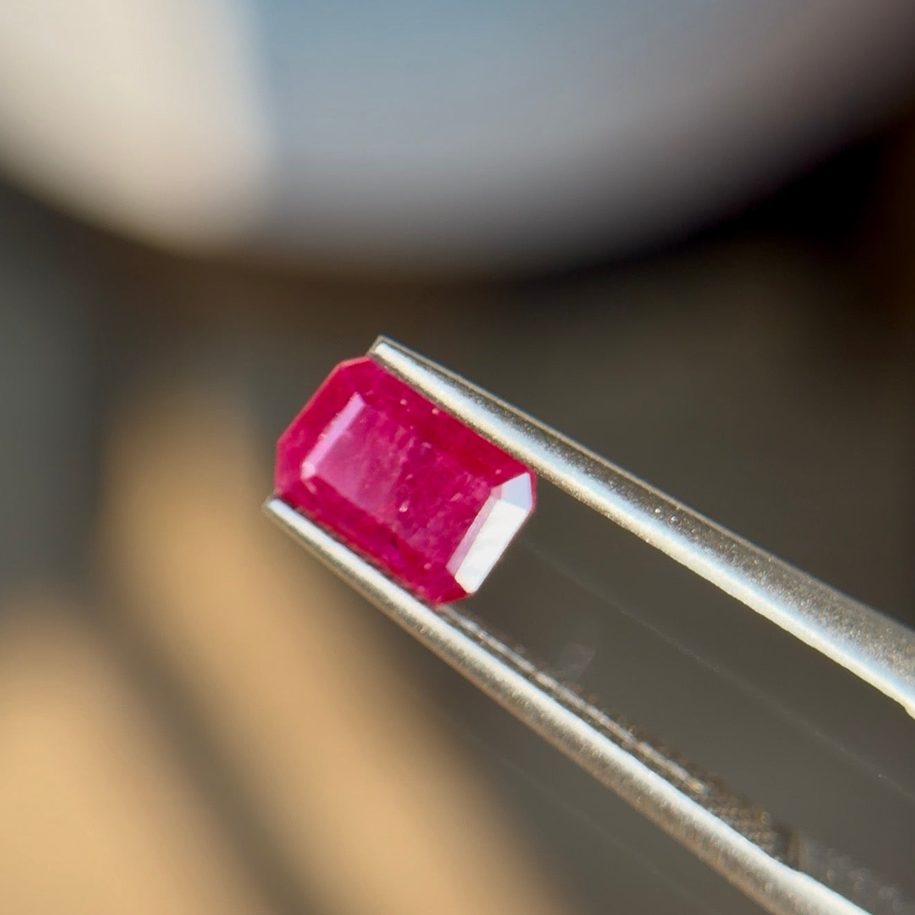 0.64 ct Natural Ruby Red Heated – Emerald Cut – Mozambique – AIG Certified