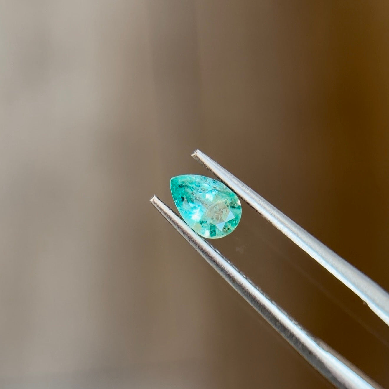 0.40 ct Natural Emerald Green – Pear Cut – Zambia – AIG Certified