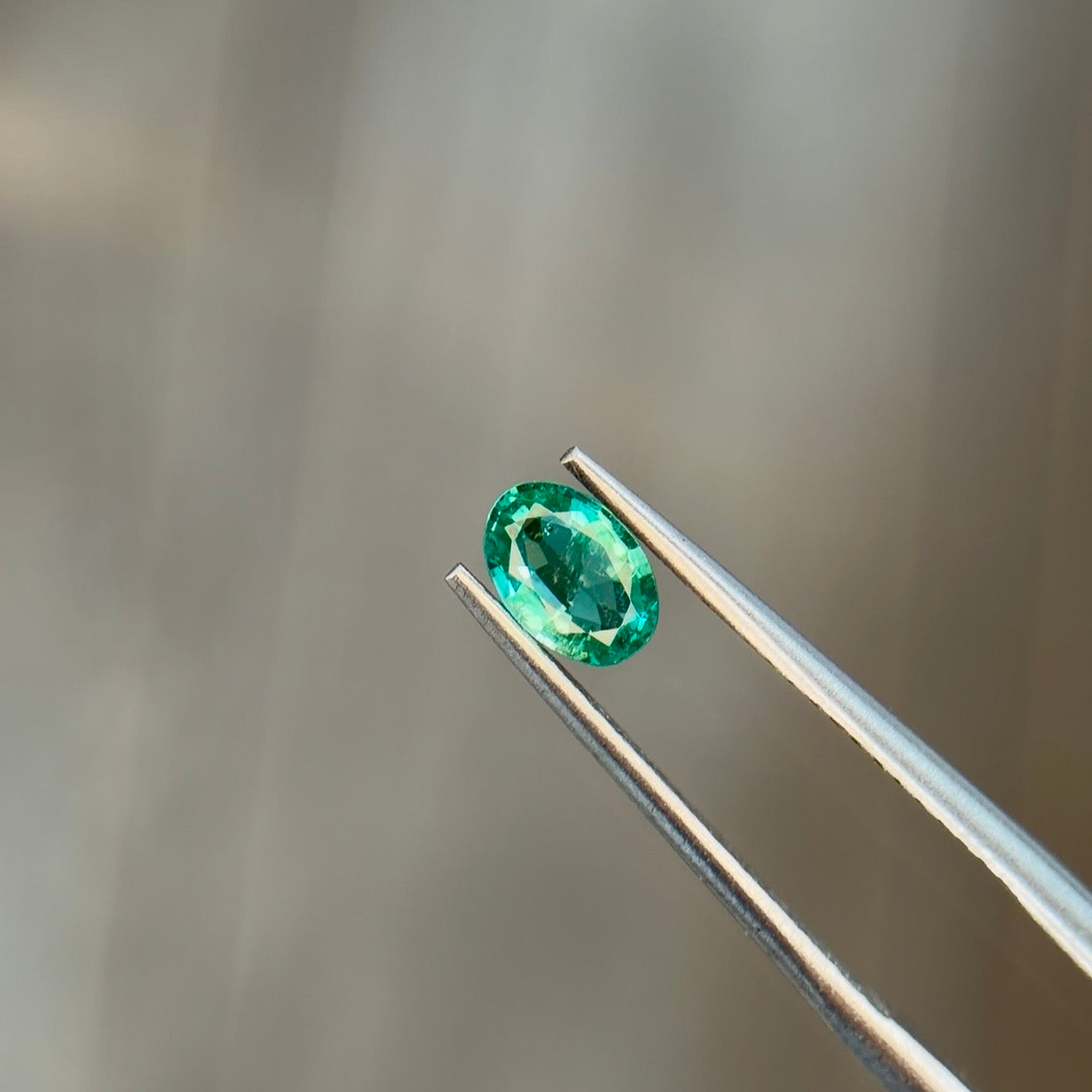 0.31 ct Natural Emerald Green – Oval Cut – Zambia – AIG Certified