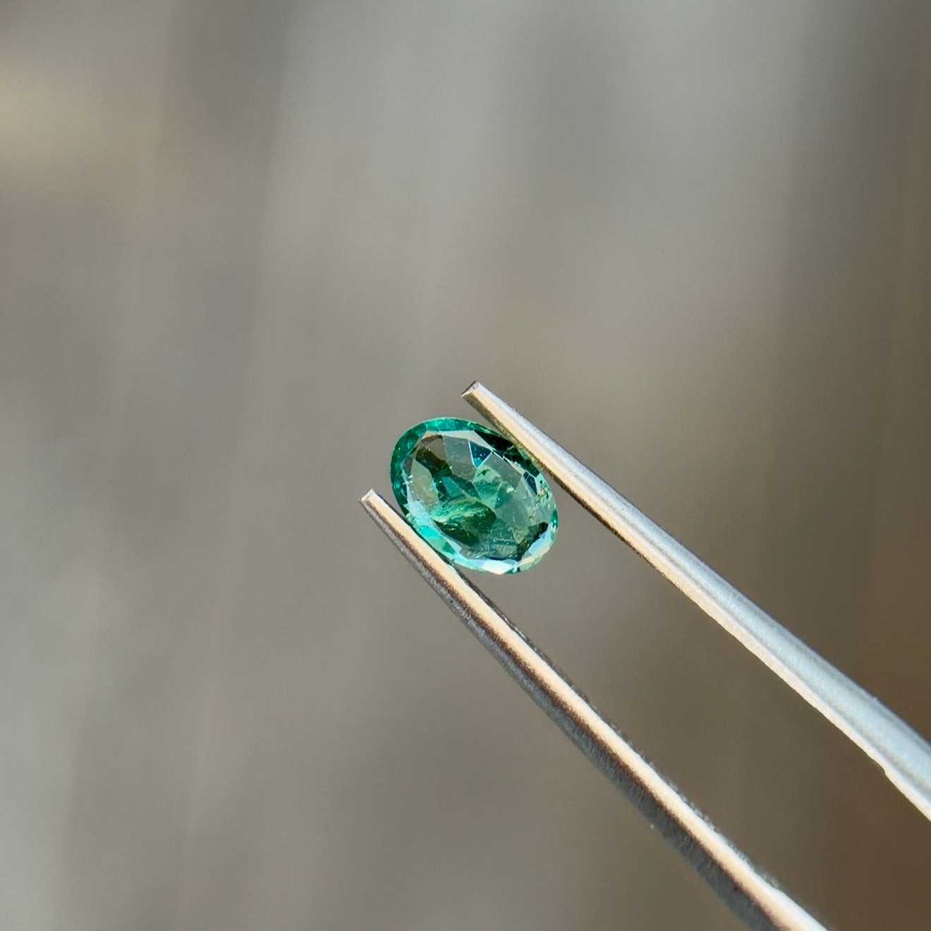 0.31 ct Natural Emerald Green – Oval Cut – Zambia – AIG Certified