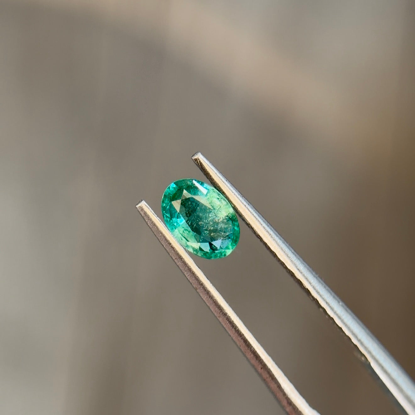 0.41 ct Natural Emerald Green – Oval Cut – Zambia – AIG Certified