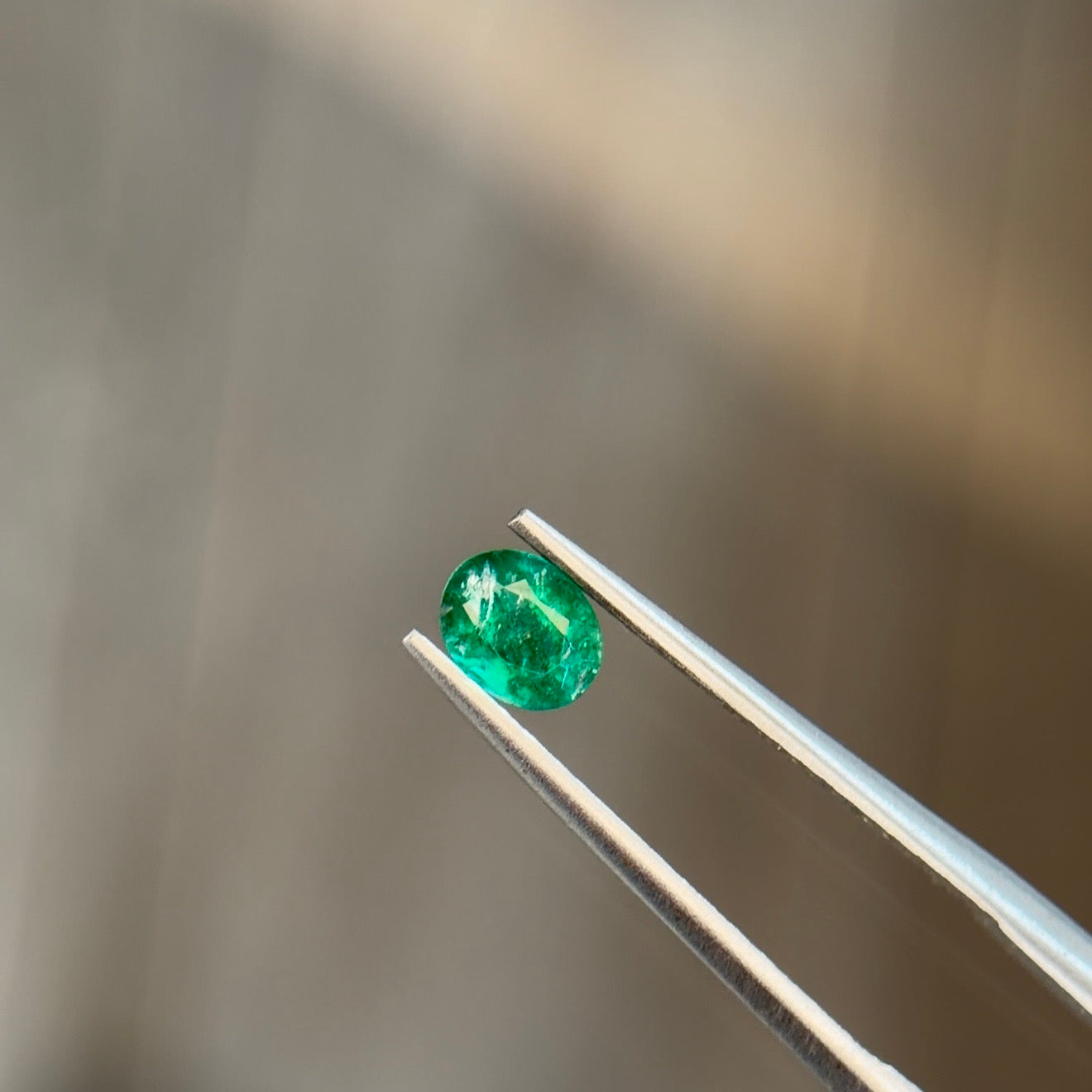 0.41 ct Natural Emerald Green – Oval Cut – Zambia – AIG Certified