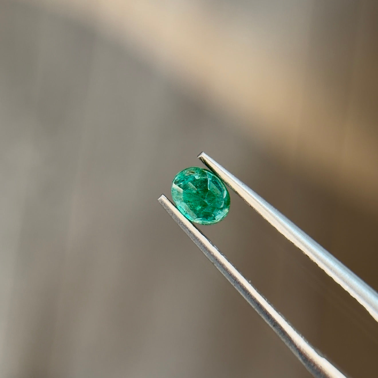 0.41 ct Natural Emerald Green – Oval Cut – Zambia – AIG Certified