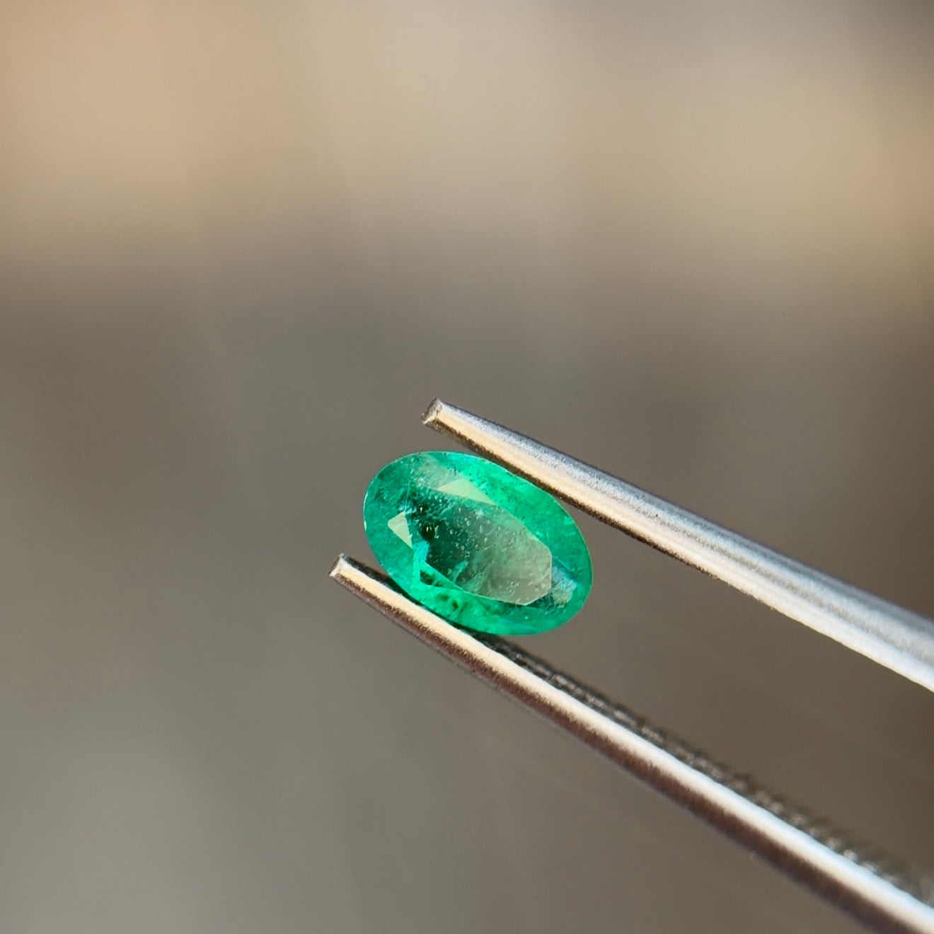 0.37 ct Natural Emerald Green – Oval Cut – Zambia – AIG Certified