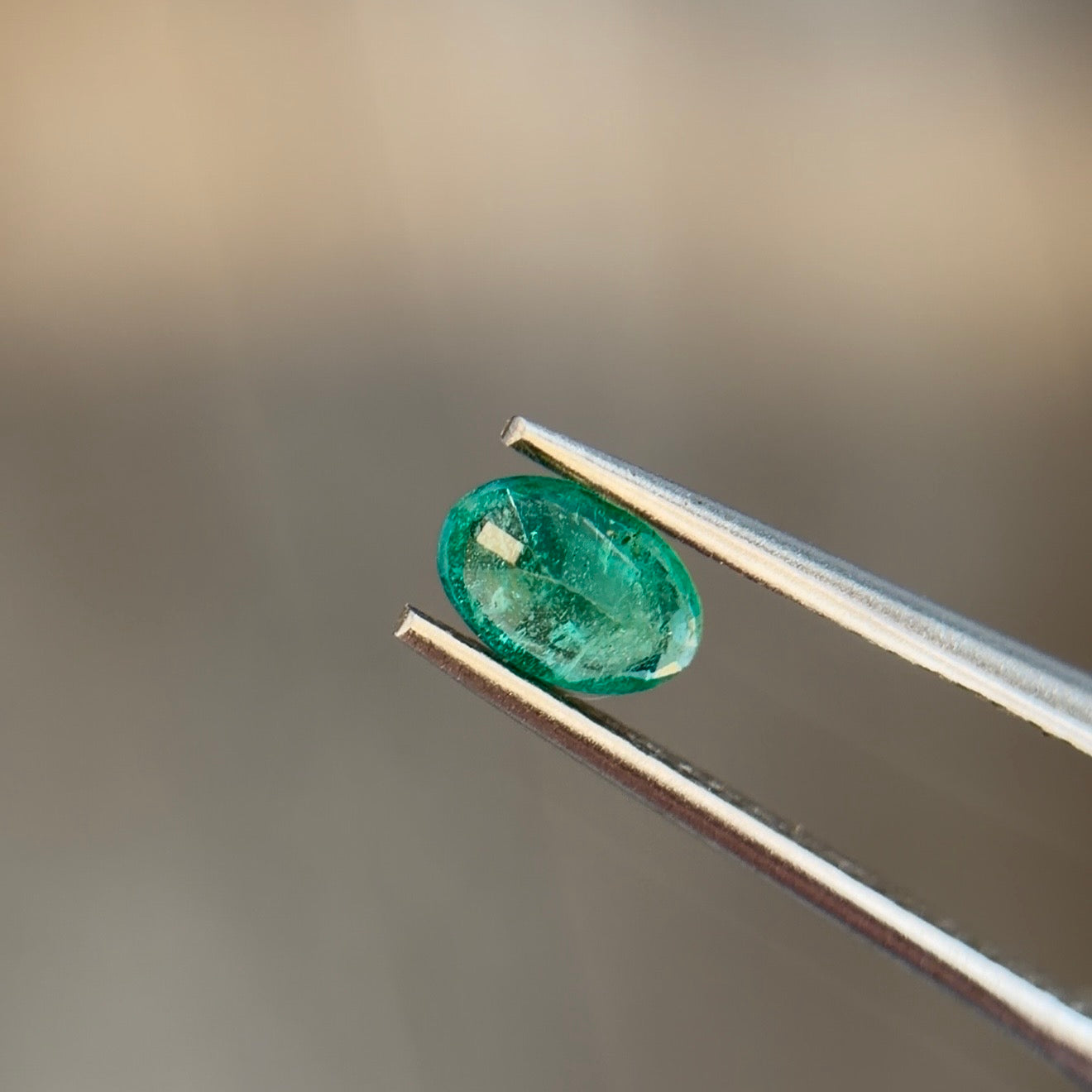 0.37 ct Natural Emerald Green – Oval Cut – Zambia – AIG Certified