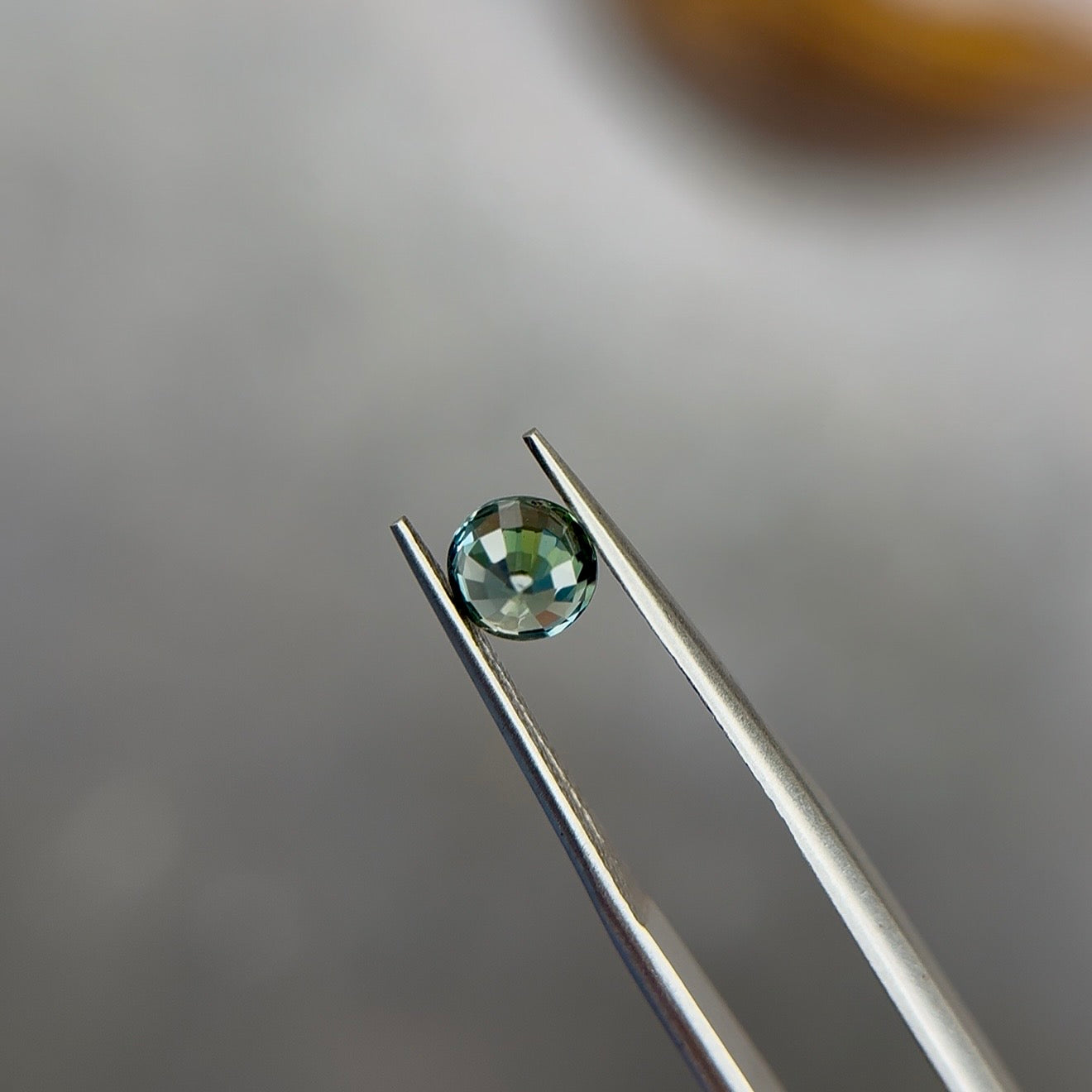 1.09 ct Natural Green Parti Sapphire (No Heat) – Round Cut – Tanzania – AIGS Certified