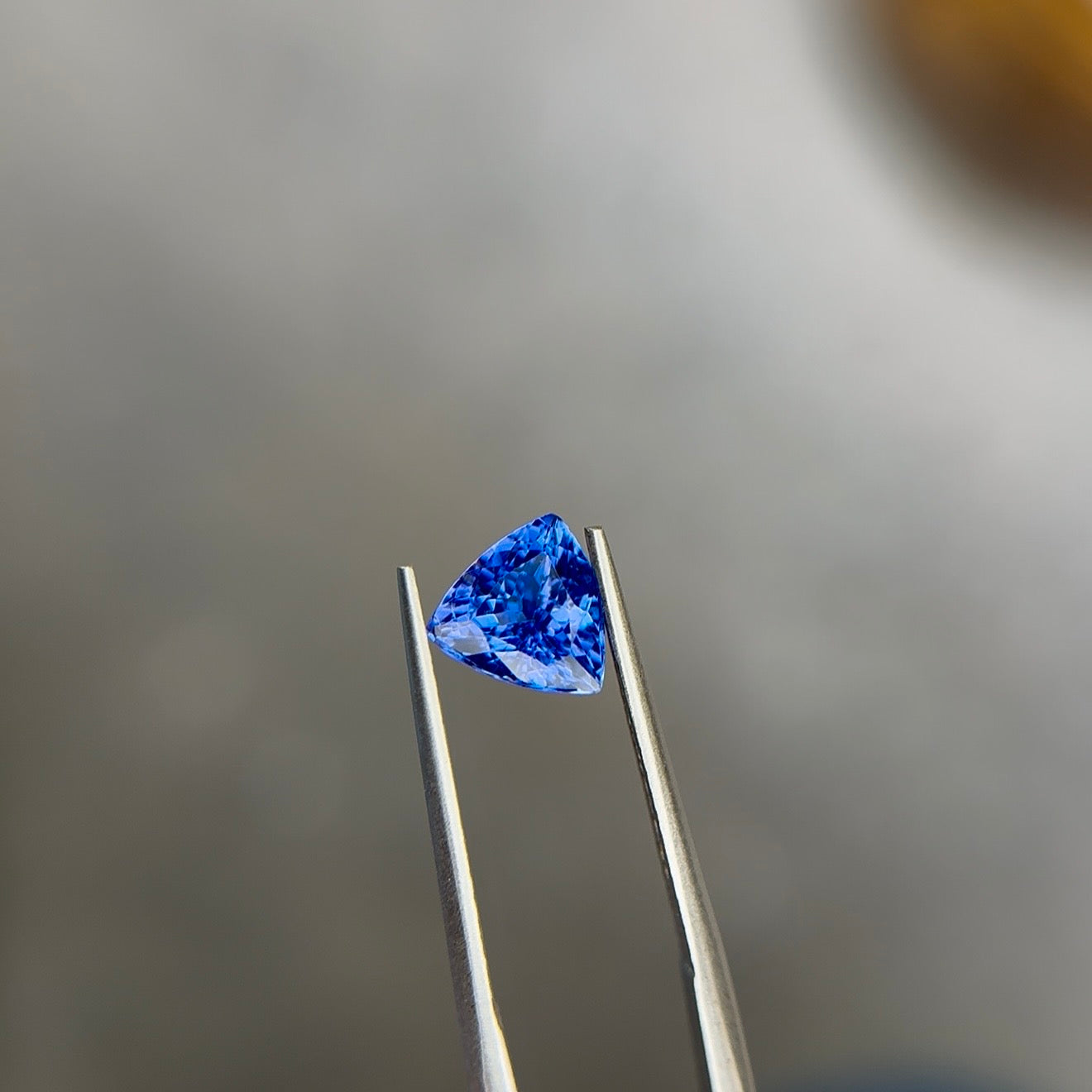 1.27 ct Natural Violetish Blue Tanzanite – Trillion Cut – AIG Certified